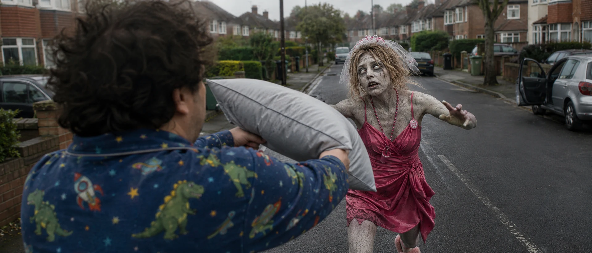 Marty defending himself with a pillow as a zombie bride approaches on a suburban street