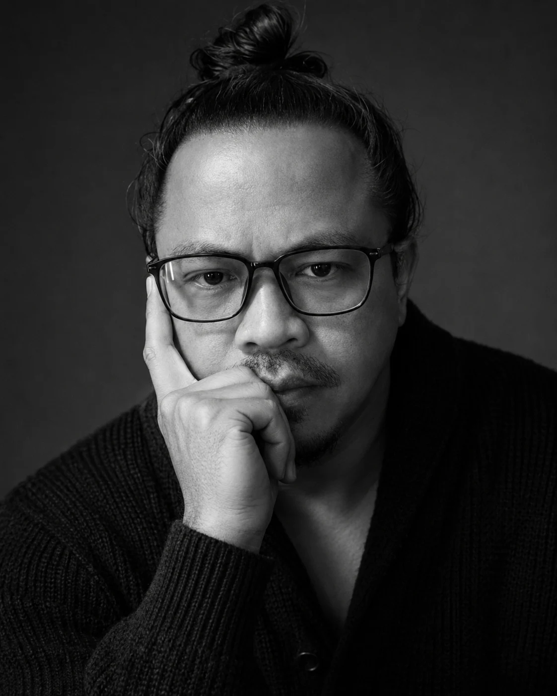 Black-and-white portrait of Raffy Dematawaran